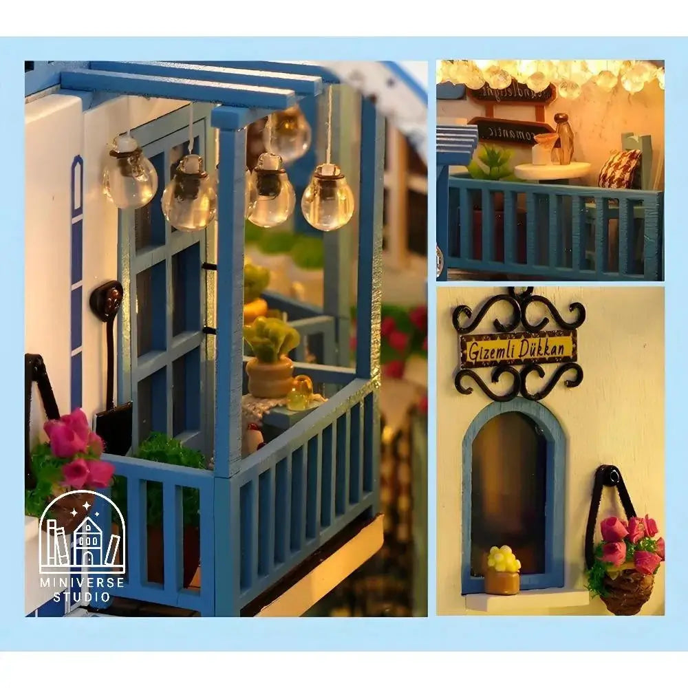 Mediterranean-style book nook kit with a flower-lined balcony and warm string lights