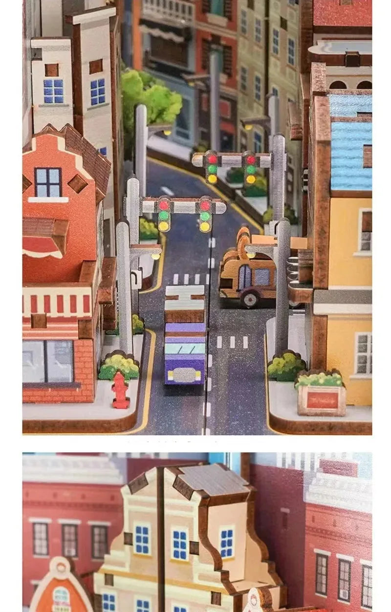 Close-up of the miniature city street with houses, traffic lights and a bus