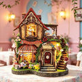 Alice in Wonderland miniature house kit, wooden cottage with a White Rabbit window, red roof and glowing lights