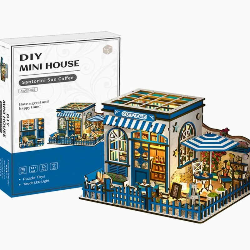 Wooden laser-cut panels, box, and included accessories for the Santorini Sun Coffee DIY kit