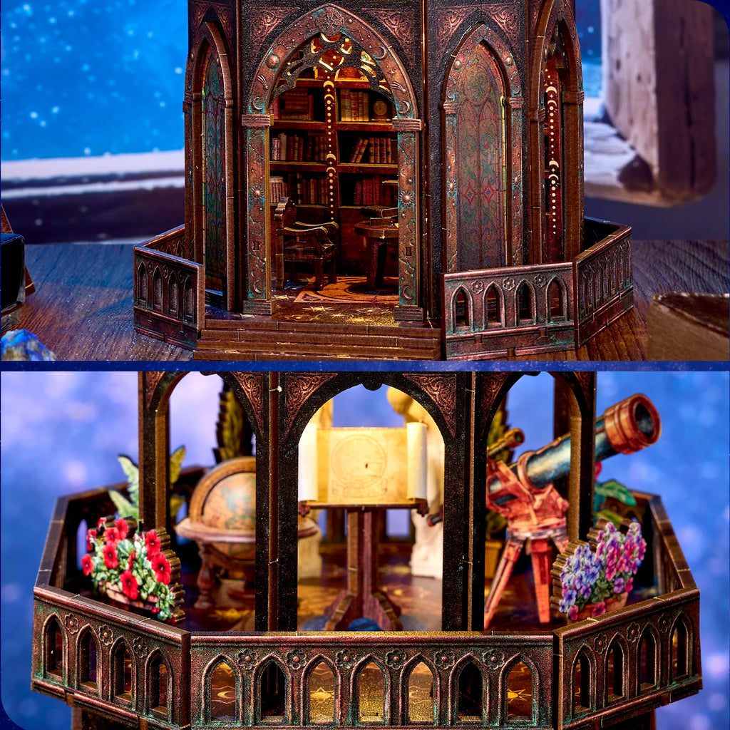 Interior study level of the observatory kit with a built-in bookshelf, desk, and chair behind gothic arches
