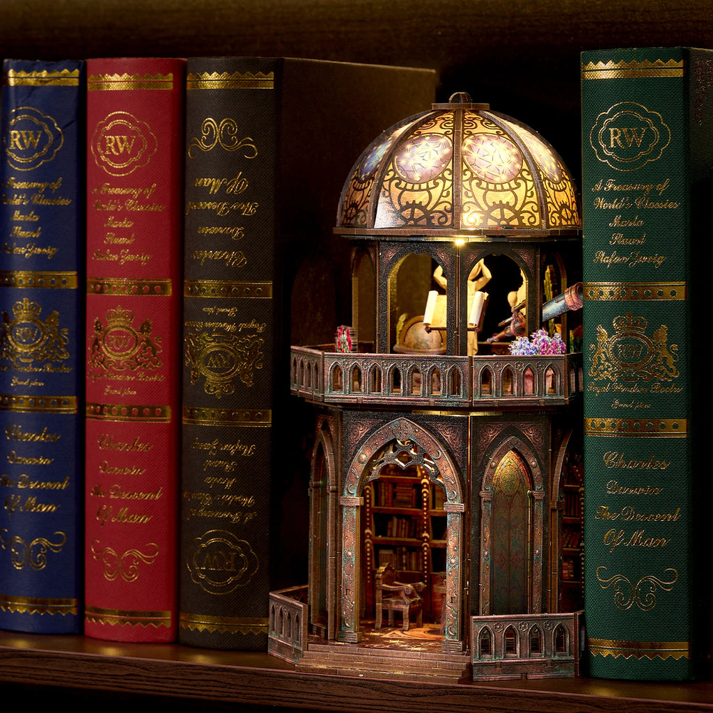 Observatory dollhouse kit balcony level with telescope, globe, and star chart, book-lined study visible below