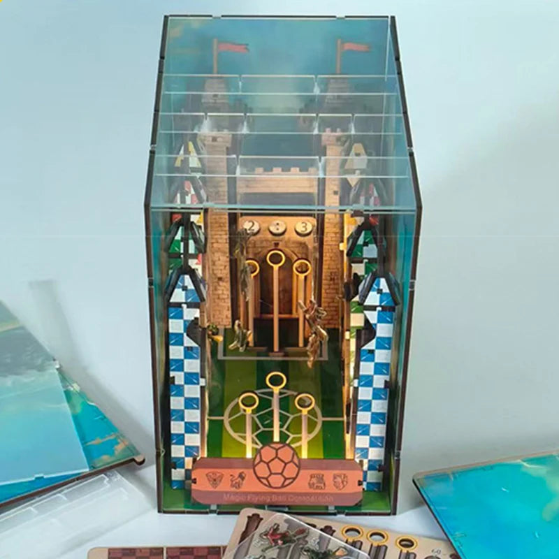Tall view of the assembled Quidditch pitch book nook with LED-lit interior and miniature stands