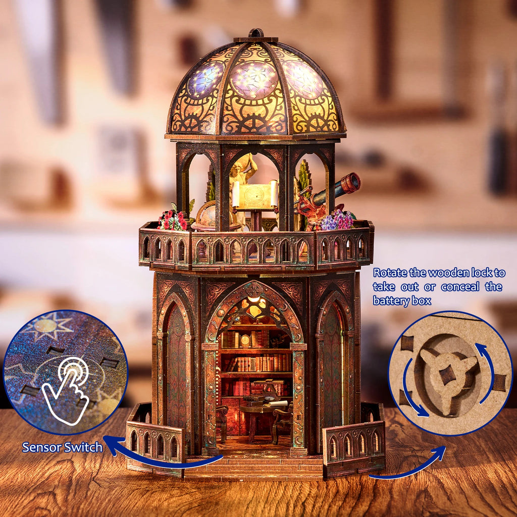 Observatory dollhouse kit on a desk showing the touch sensor light switch and the battery box lock mechanism