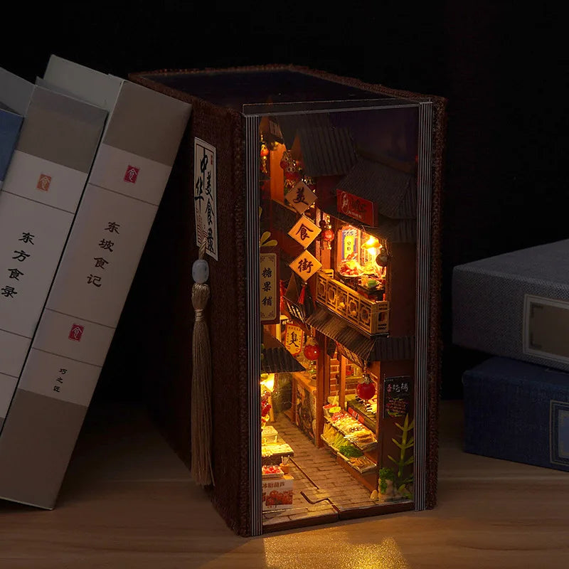 Close-up of the lantern-strung night market alley in the book nook kit