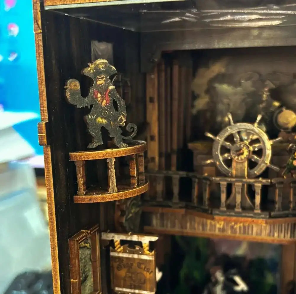 Monkey sailor on the crow's nest of the pirate ship book nook