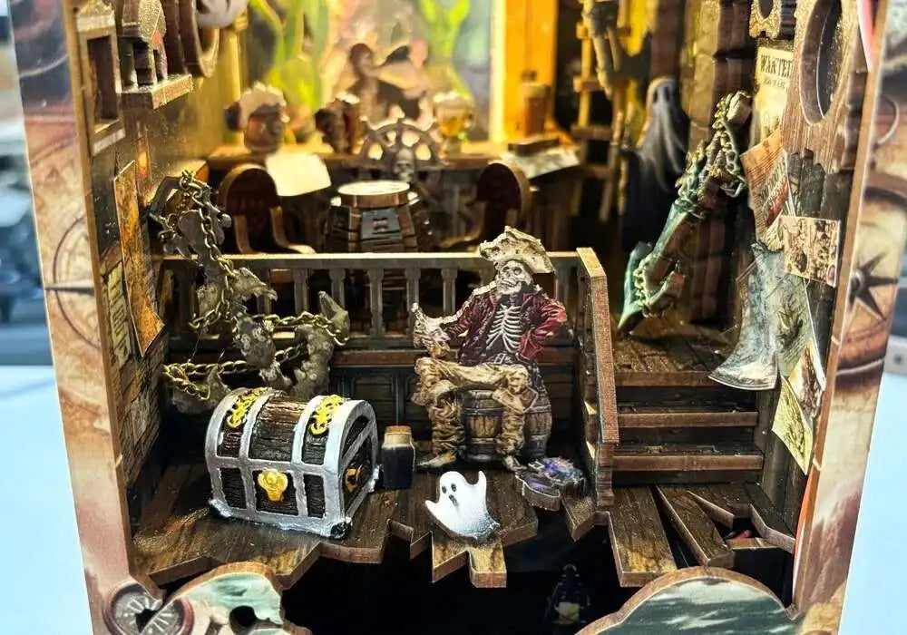 Skeleton guard sitting next to the treasure chest with a little ghost floating by the stairs