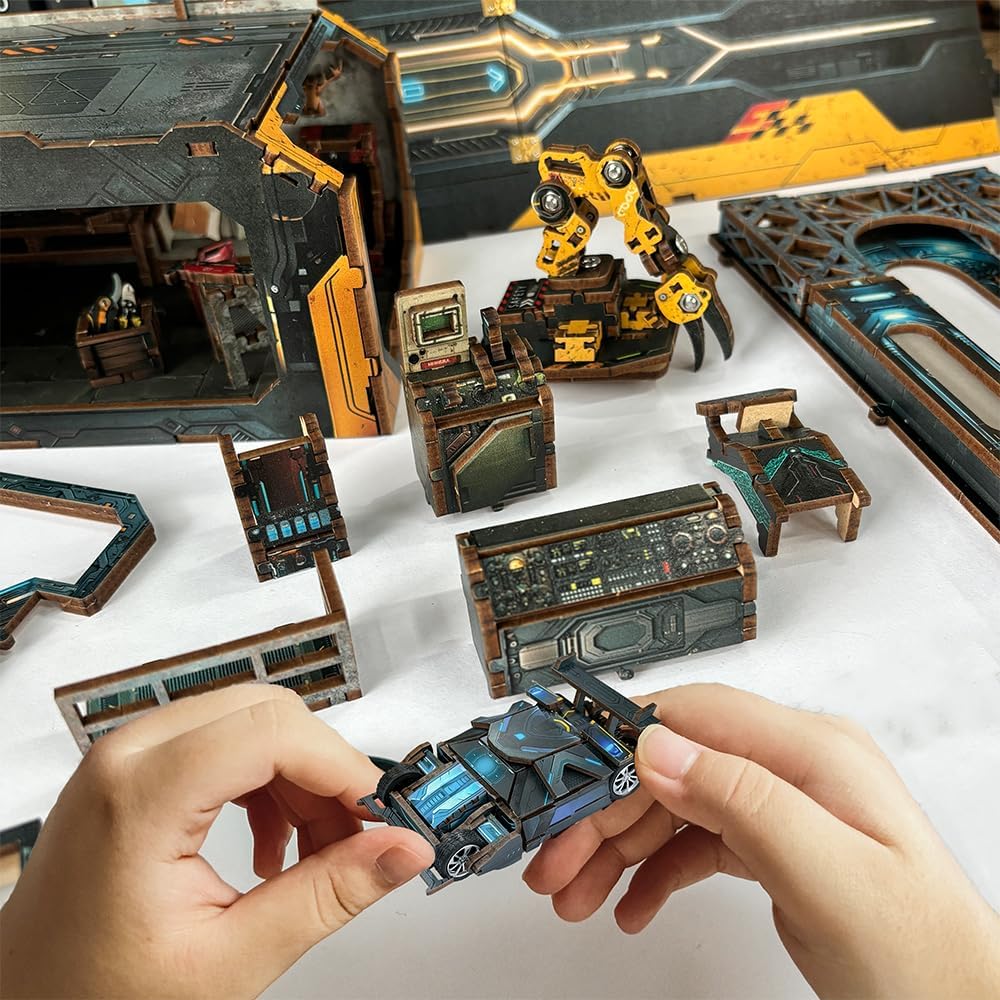 Hands placing the miniature sports car while building the garage book nook