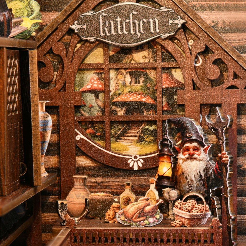 Close-up of the Kitchen scene in the Snow White book nook, with a roast dinner, cookies, and a lantern-holding dwarf figure